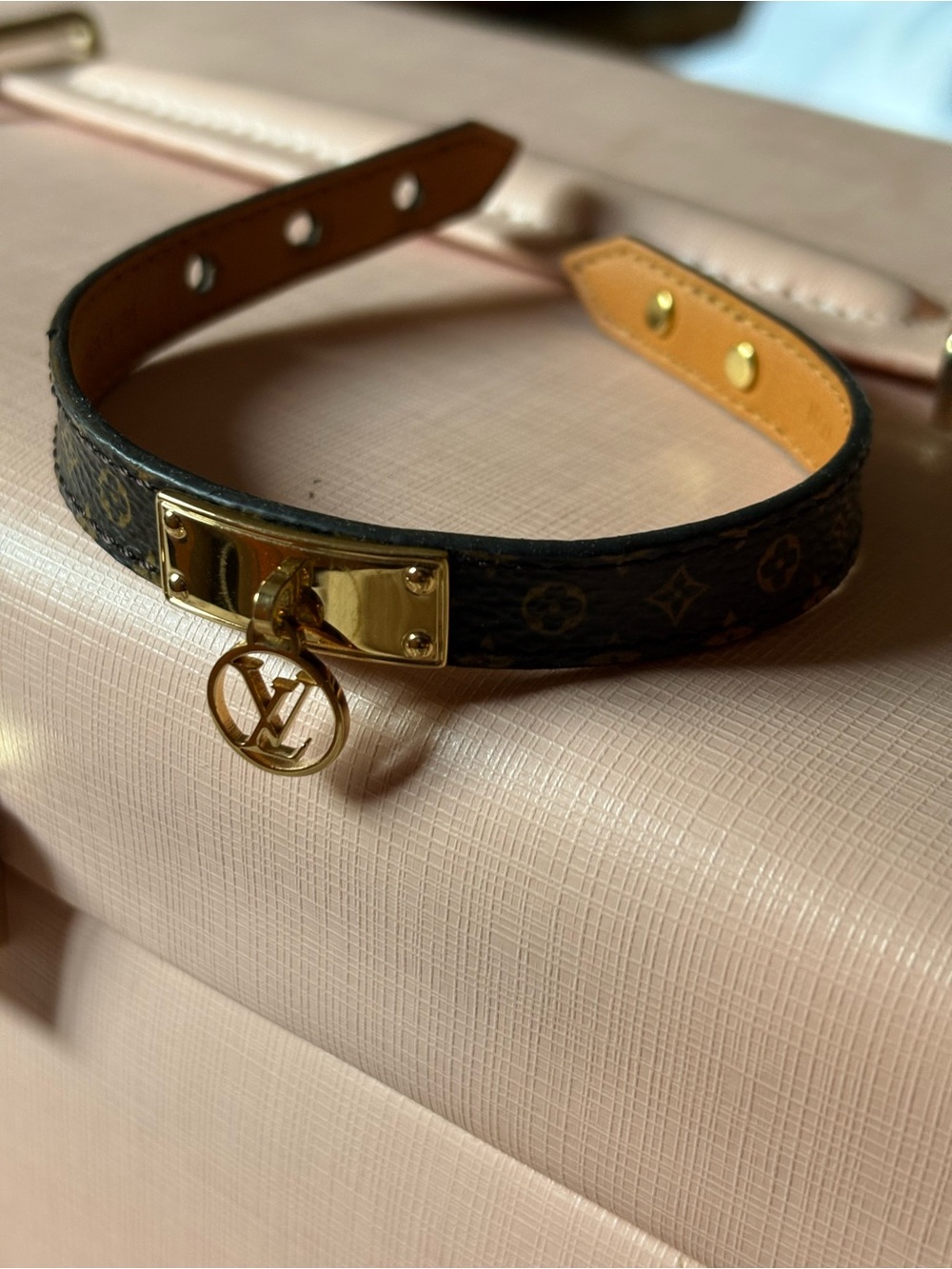 Louis Vuitton Monogram Bracelet in Brown with Gold Charm